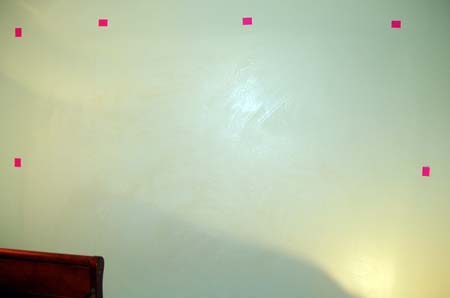 First, dad and I marked a plumb line and used pink sticky notes to mark the boundarys for the wallpaper sizing.